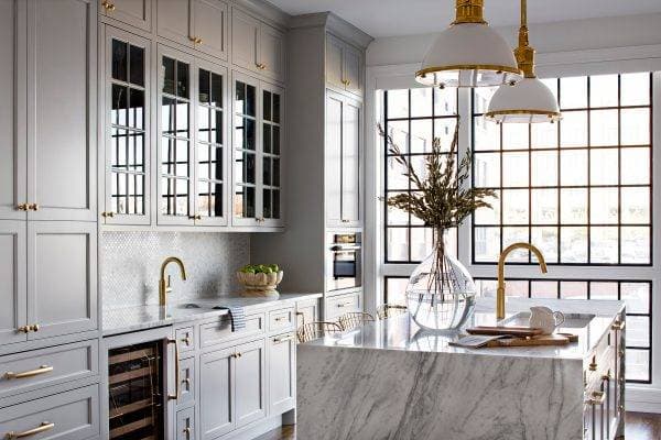 Gray Kitchen With Brass Accents
