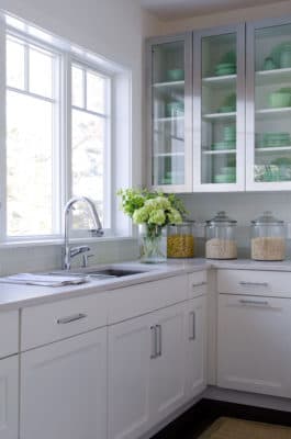 White Kitchen With Metal Accent Doors